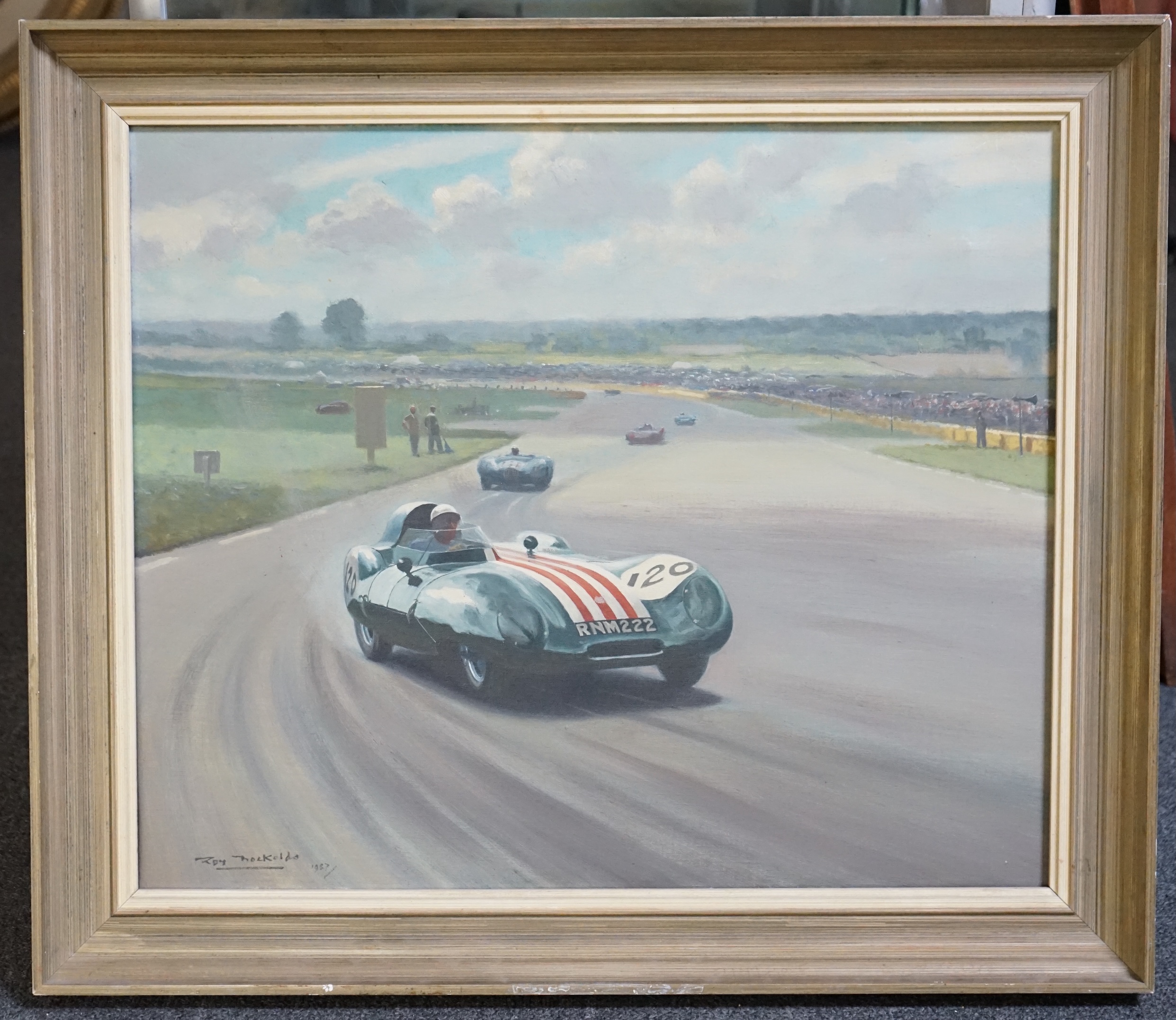 Roy Nockolds (English, 1911-1979), 1957 Goodwood Chichester Cup motor racing scene with Lotus Climax 11 driven by David Piper, oil on canvas, 50 x 60cm